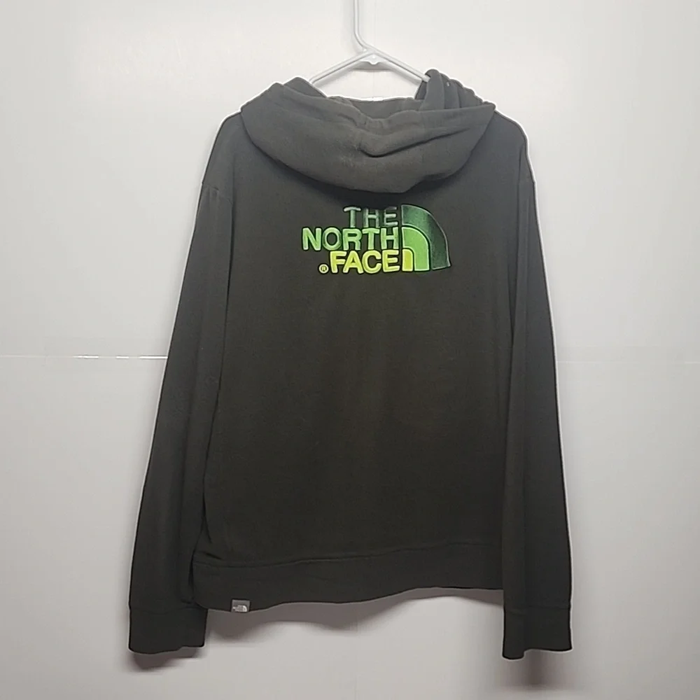 The North Face olive green embroidered  long sleeve hooded sweatshirt.